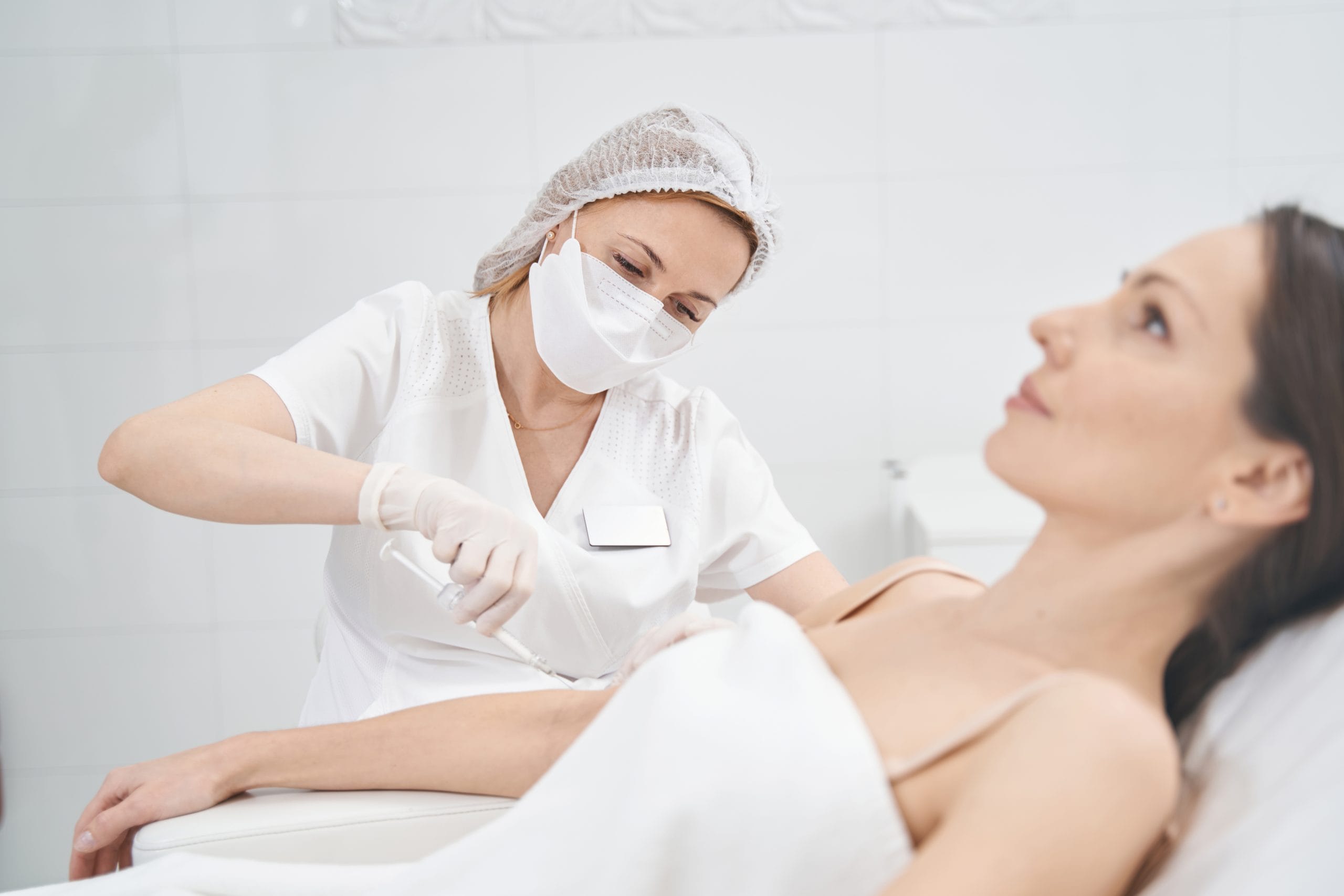 nurse caring for a patient 